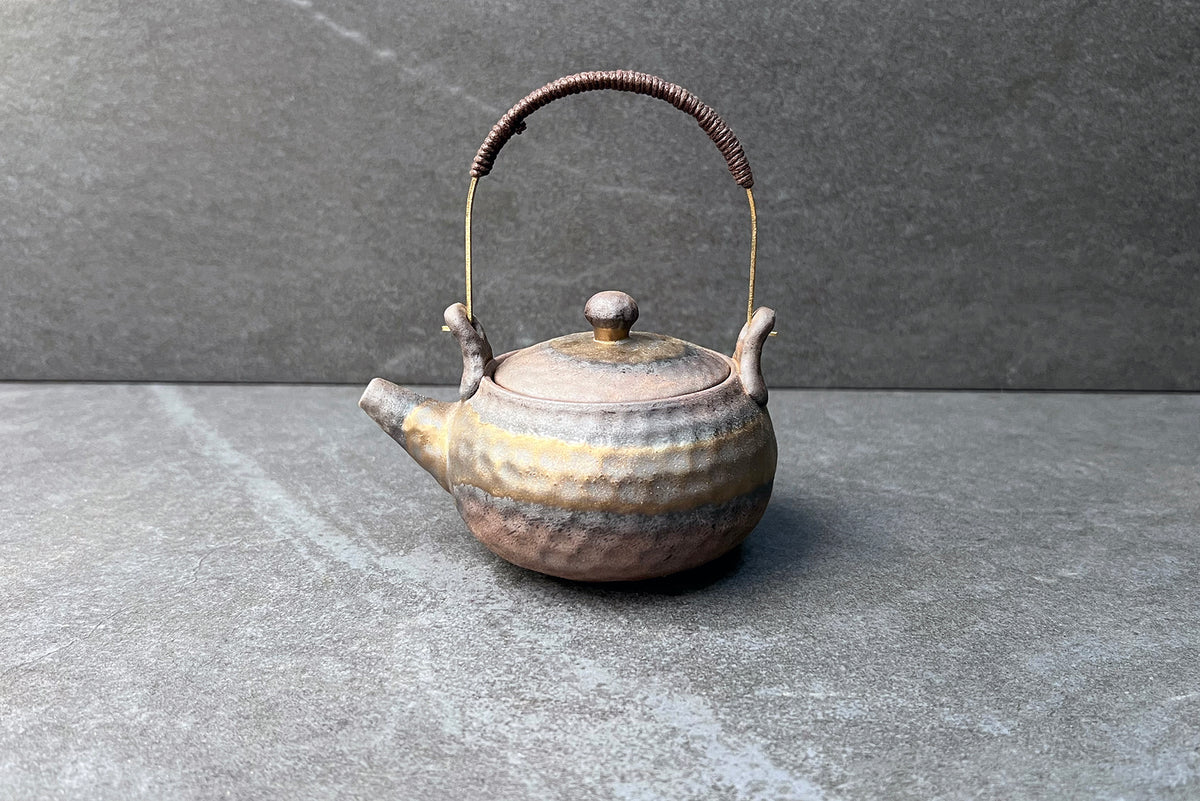 Traditional Teapot with Golden Glaze Hammer Style